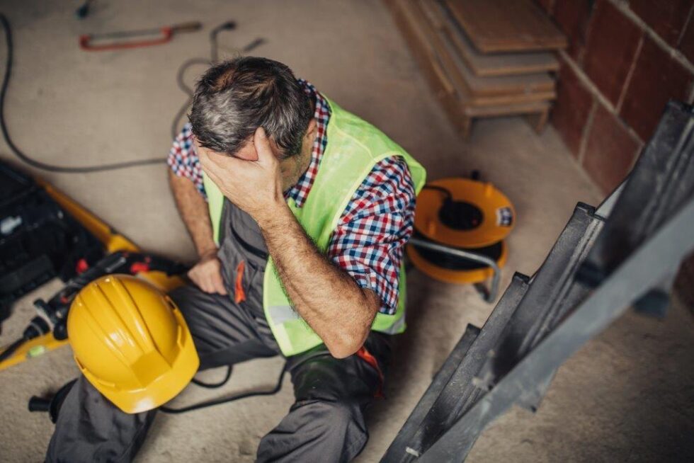 Injured worker reviewing workers' compensation paperwork